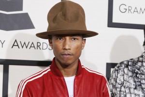 Pharrell Williams and Helen Lasichanh arrive at the 56th annual Grammy Awards in Los Angeles