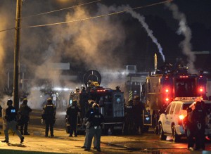 Image: Curfew set after violent protests flare amid over Michael Brown shooting